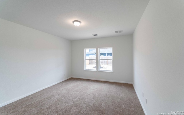 316 Ivy Rds, Seguin, TX 78155 - unfurnished room featuring carpet, visible vents, and baseboards