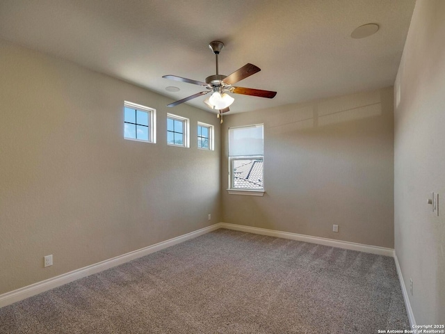 unfurnished room with baseboards, carpet floors, and ceiling fan