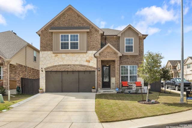 traditional home with brick siding, board and batten siding, a shingled roof, a front lawn, and concrete driveway