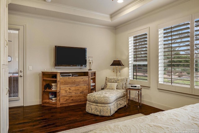 bedroom with baseboards, ornamental molding, and hardwood / wood-style flooring