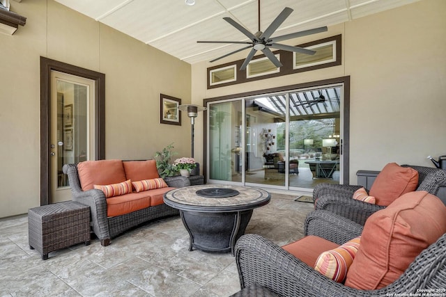 view of patio featuring an outdoor living space and ceiling fan