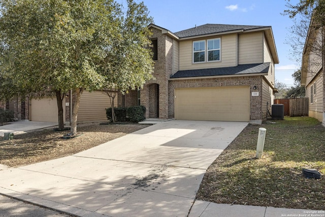 view of front of property featuring driveway, roof with shingles, an attached garage, central AC, and brick siding