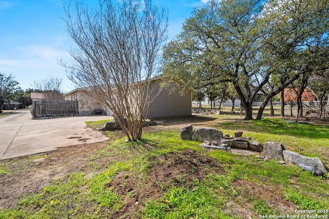 view of yard with fence