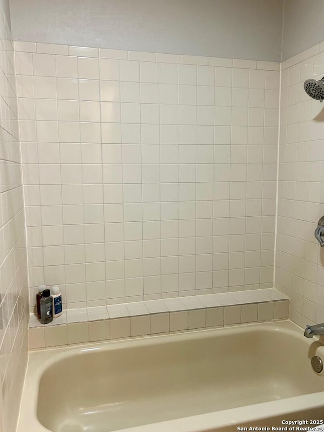 bathroom featuring  shower combination