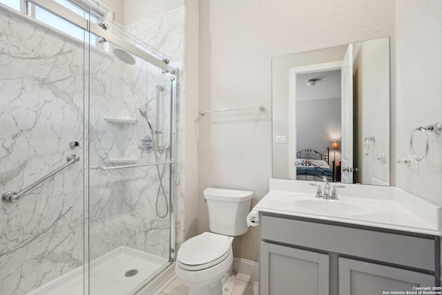 12519 Upton Park, San Antonio, TX 78253 - ensuite bathroom with vanity, ensuite bath, toilet, and a marble finish shower