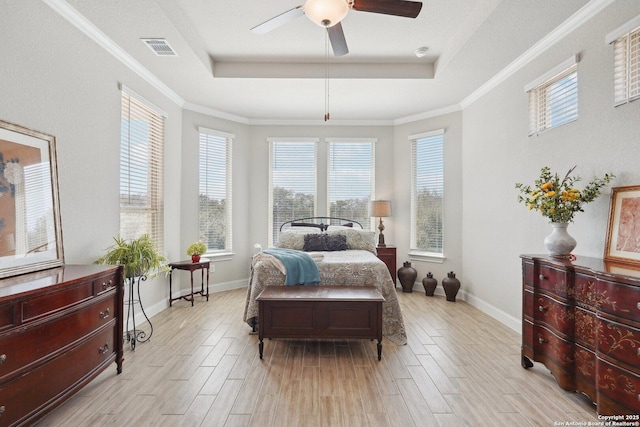 12519 Upton Park, San Antonio, TX 78253 - bedroom featuring visible vents, light wood-type flooring, and a tray ceiling