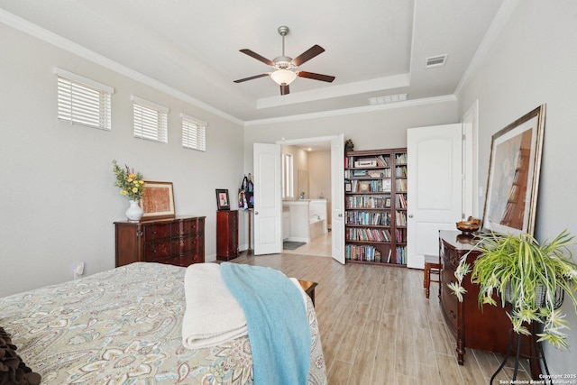 12519 Upton Park, San Antonio, TX 78253 - bedroom with visible vents, a raised ceiling, light wood-style flooring, and ornamental molding