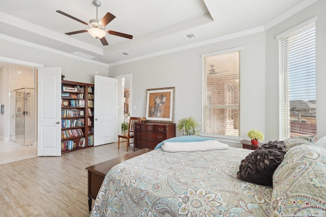 12519 Upton Park, San Antonio, TX 78253 - bedroom featuring a tray ceiling, visible vents, wood finished floors, and crown molding