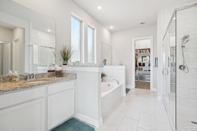 12519 Upton Park, San Antonio, TX 78253 - bathroom with visible vents, a stall shower, a bath, marble finish floor, and vanity