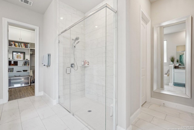 12519 Upton Park, San Antonio, TX 78253 - full bath with baseboards, visible vents, marble finish floor, and a stall shower