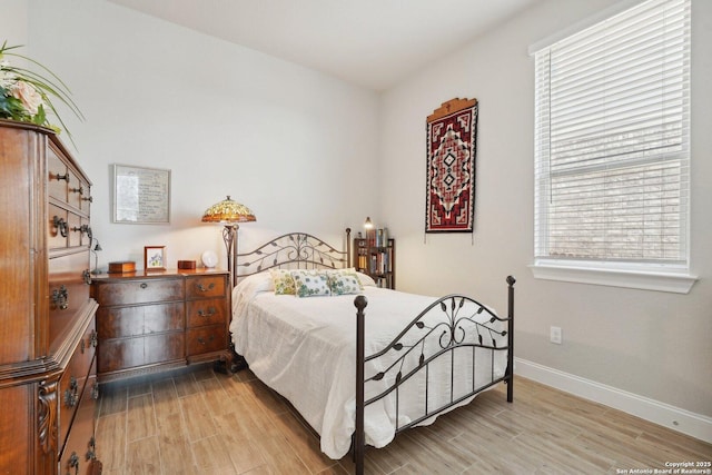 12519 Upton Park, San Antonio, TX 78253 - bedroom with baseboards and wood finished floors