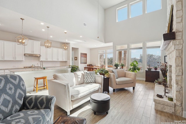12519 Upton Park, San Antonio, TX 78253 - living room with recessed lighting, light wood-style floors, visible vents, and a healthy amount of sunlight