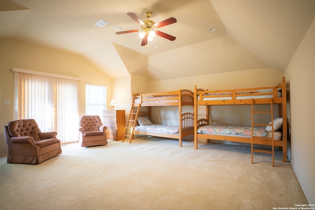 bedroom featuring visible vents, ceiling fan, carpet, and vaulted ceiling