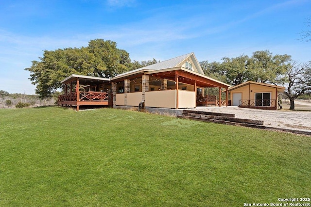 view of home's exterior featuring a garage, driveway, and an outdoor structure