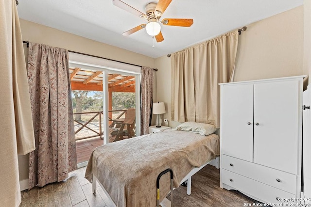 bedroom featuring a ceiling fan and wood finished floors