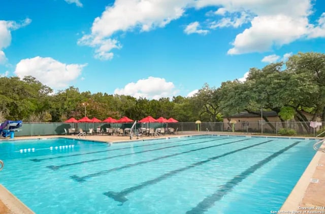 community pool with fence