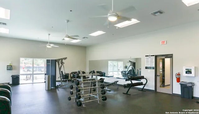 gym featuring visible vents and lofted ceiling