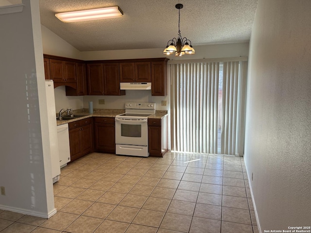 kitchen with white appliances, a sink, light countertops, under cabinet range hood, and a chandelier