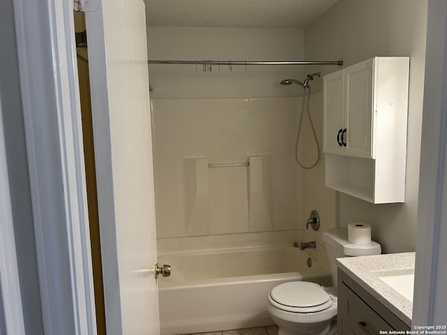 full bathroom with a textured ceiling, toilet, vanity, and bathtub / shower combination