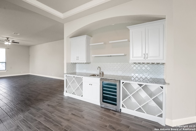 605 Albarella, Cibolo, TX 78108 - bar featuring wine cooler, a sink, tasteful backsplash, baseboards, and dark wood finished floors