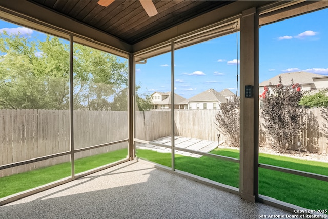 605 Albarella, Cibolo, TX 78108 - unfurnished sunroom featuring a ceiling fan, a residential view, and plenty of natural light