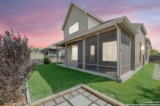 605 Albarella, Cibolo, TX 78108 - back of property at dusk with a sunroom