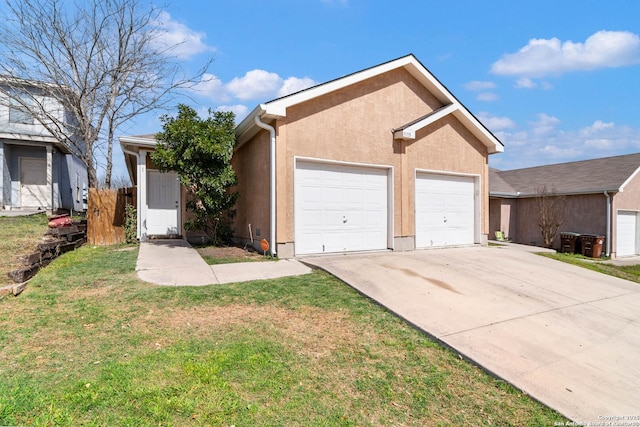 ranch-style house featuring stucco siding, a garage, and a front lawn