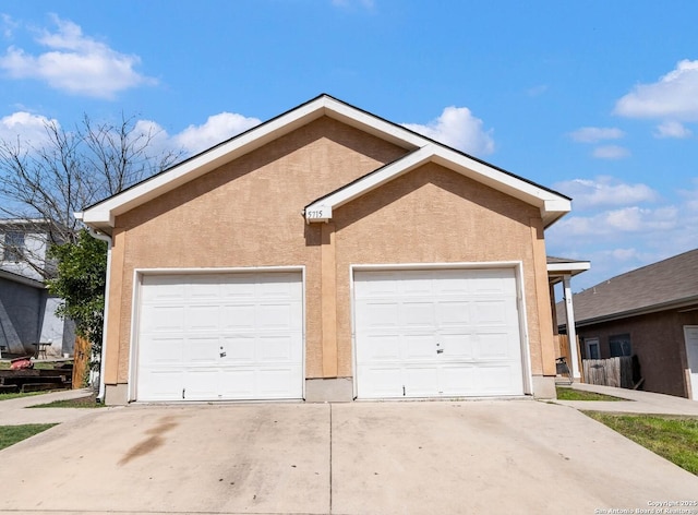 garage with driveway