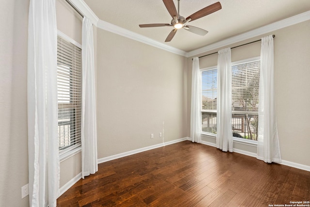 unfurnished room featuring wood finished floors, a ceiling fan, baseboards, and ornamental molding