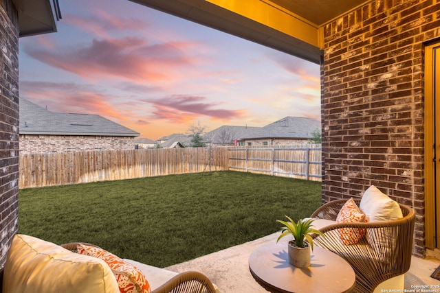 view of yard with a fenced backyard