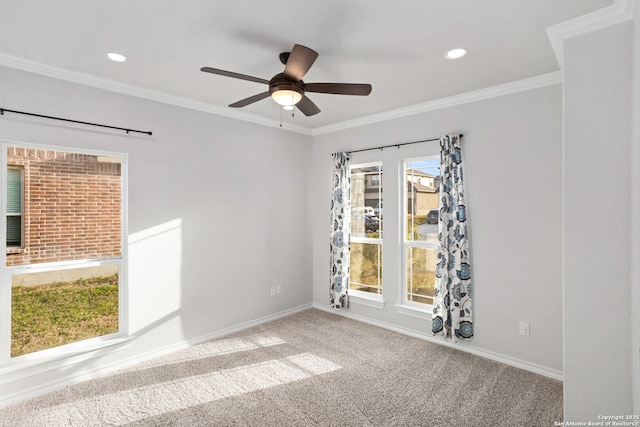 unfurnished room featuring ornamental molding, a ceiling fan, recessed lighting, carpet flooring, and baseboards