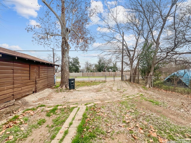 view of yard featuring fence