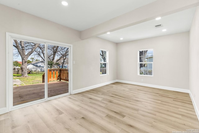 unfurnished room with recessed lighting, visible vents, baseboards, and light wood-style floors