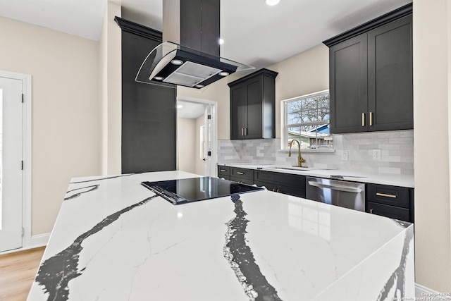 kitchen featuring a sink, stainless steel dishwasher, dark cabinetry, and island range hood