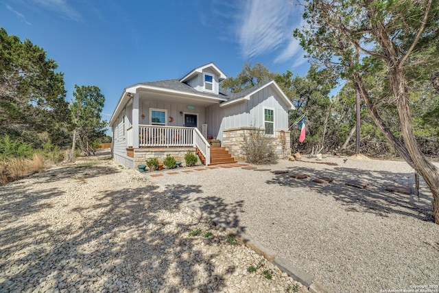 view of front of house with covered porch and board and batten siding