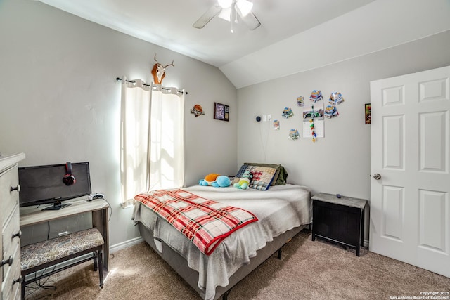 bedroom featuring ceiling fan, baseboards, carpet, and lofted ceiling