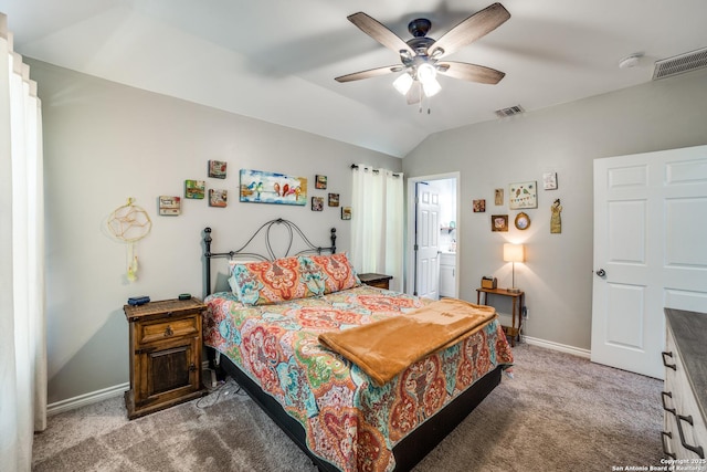 bedroom with visible vents, lofted ceiling, carpet, and baseboards