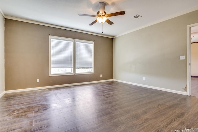 unfurnished room with a ceiling fan, baseboards, visible vents, and dark wood-style flooring