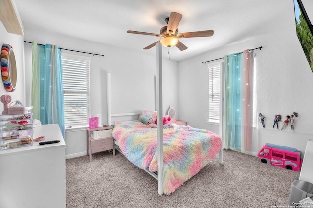 carpeted bedroom featuring ceiling fan