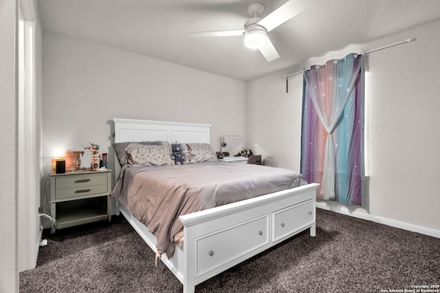 bedroom featuring baseboards, a ceiling fan, and dark carpet