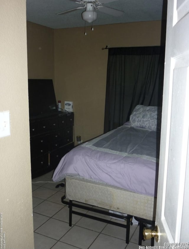 bedroom featuring tile patterned flooring