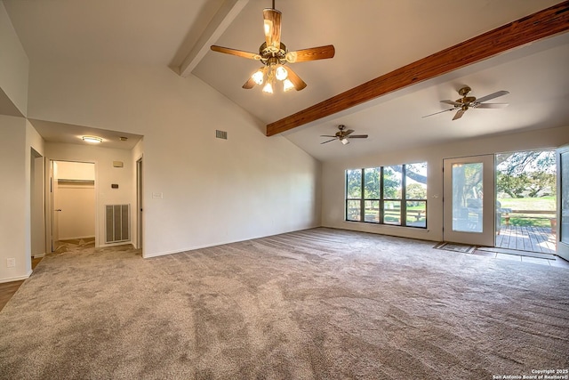 spare room with visible vents, beam ceiling, high vaulted ceiling, and carpet