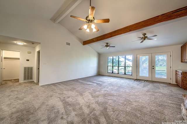 empty room with visible vents, light colored carpet, beamed ceiling, and high vaulted ceiling