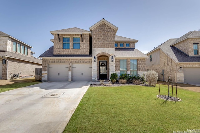 view of front of home with brick siding, a shingled roof, concrete driveway, a front yard, and a garage