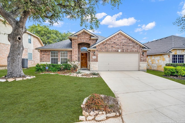 ranch-style house with a front yard, driveway, a shingled roof, a garage, and brick siding