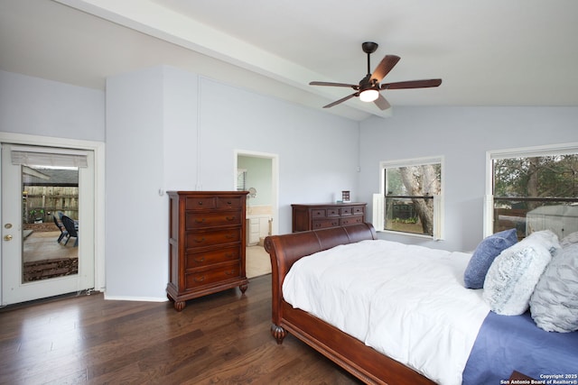 bedroom featuring dark wood finished floors, vaulted ceiling, ensuite bath, a ceiling fan, and access to outside