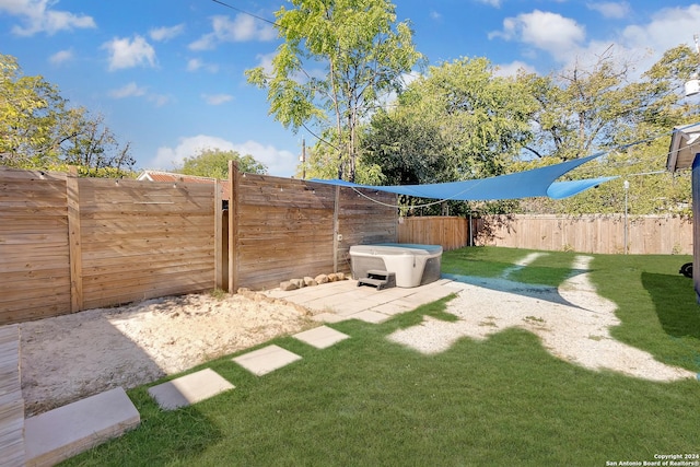 view of yard with a patio and a fenced backyard