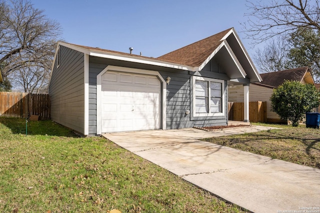 view of front of house with driveway, a front lawn, a garage, and fence