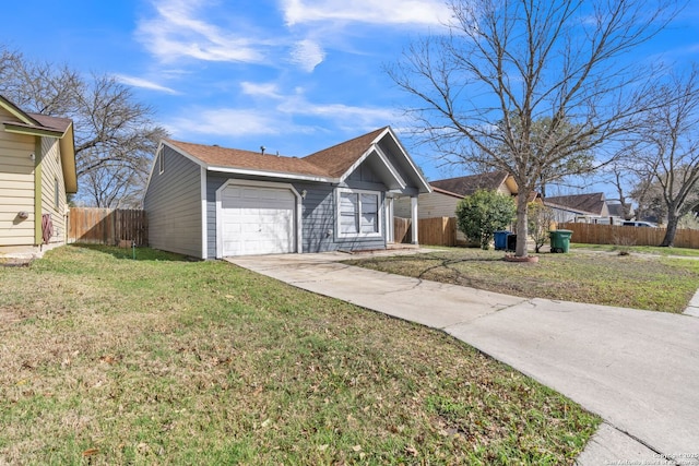 ranch-style house with concrete driveway, fence, a garage, and a front yard