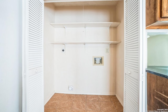 laundry room featuring light tile patterned floors, baseboards, laundry area, electric dryer hookup, and washer hookup